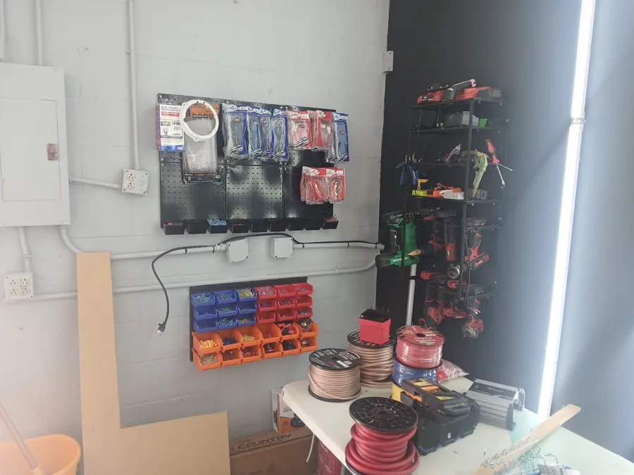 Wire, tools and parts on the install wall at Simply Pro Audio in DeBary, FL