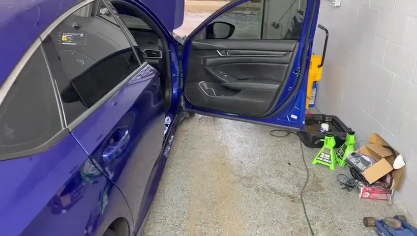 Door panel off for a speaker upgrade on a sedan in DeBary, FL